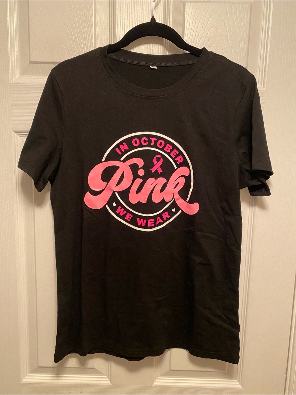 Women’s Black Short Sleeve Tee with Pink Awareness Script…size M